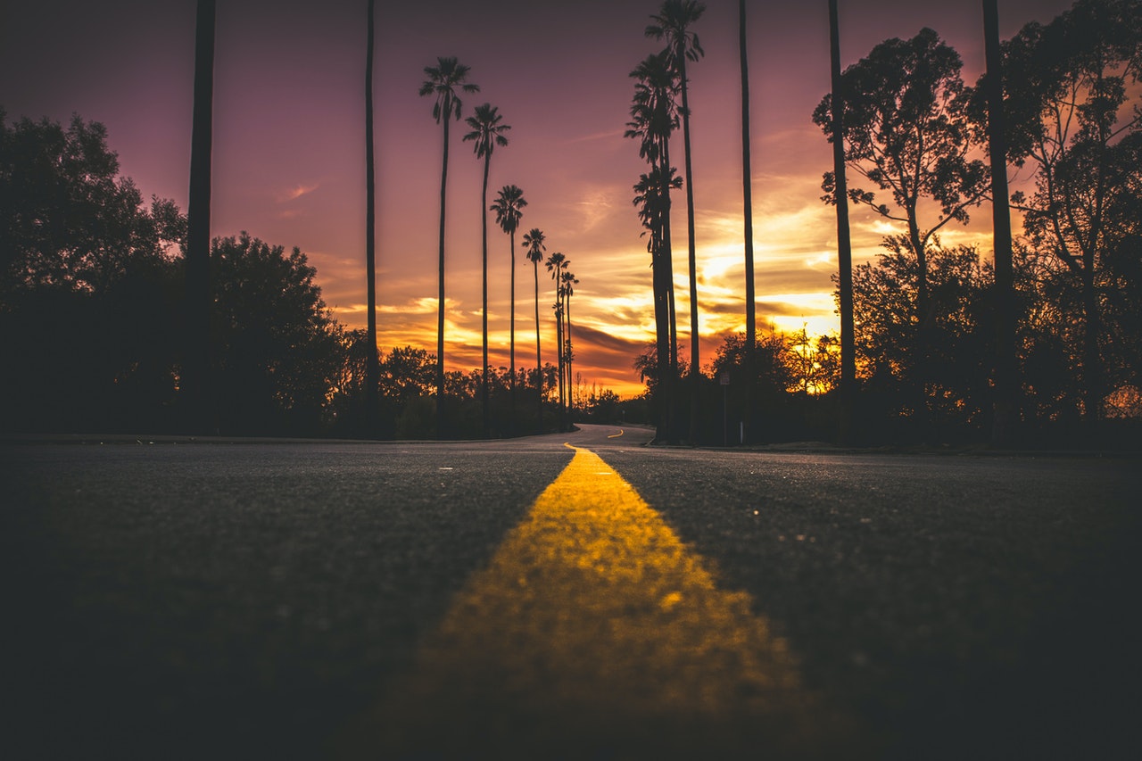 road-in-city-during-sunset-248159